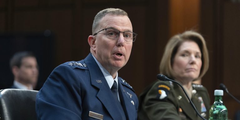 Gen. Gregory Guillot, Air Force Commander, United States Northern Command and North American Aerospace Defense Command, left, and Gen. Laura Richardson, Army Commander, United States Southern Command, testify before the Senate Armed Services Committee on Capitol Hill in Washington, Thursday, March 14, 2024.