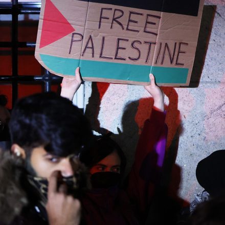 NEW YORK, NEW YORK - NOVEMBER 20: People gather to protest the banning of Students for Justice in Palestine (SJP) and Jewish Voice for Peace (JVP) at Columbia University on November 20, 2023 in New York City. Students, alumni of both schools, some dressed in caps and gowns, and supporters held a "Denouncement Ceremony" and pledged not to donate money to the schools after the banning of the student groups for holding a nonviolent but unsanctioned protest demanding a ceasefire in Gaza. More than 20 progressive elected officials have sent a letter to the university calling for the reinstatement of the groups. Calls for a ceasefire in Gaza continue as the death toll from Israel’s invasion of Gaza has increased in the weeks since the October 7 Hamas attack. (Photo by Michael M. Santiago/Getty Images)