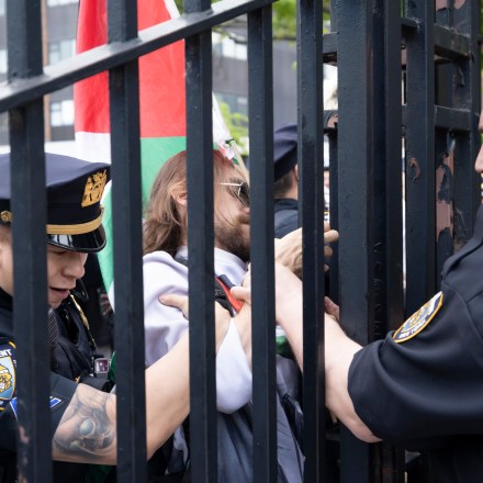 Police arrest a protester outside the campus gates of Brooklyn College during a student-led protest against the ongoing war in Gaza on May 8, 2025 in Brooklyn, New York.