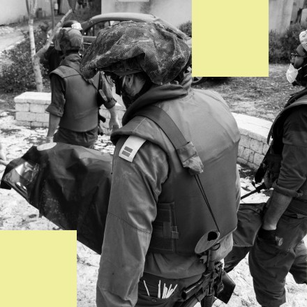 KFAR AZA, ISRAEL - OCTOBER 10: IDF soldiers remove the body of civilians who were killed days earlier in an attack by Hamas militants on this kibbutz near the border with Gaza, on October 10, 2023 in Kfar Aza, Israel. Israel has sealed off Gaza and conducted airstrikes on Palestinian territory after an attack by Hamas killed hundreds and took more than 100 hostages. On October 7, the Palestinian militant group Hamas launched a surprise attack on Israel from Gaza by land, sea, and air, killing over 700 people and wounding more than 2000. Israeli soldiers and civilians have also been taken hostage by Hamas and moved into Gaza. The attack prompted a declaration of war by Israeli Prime Minister Benjamin Netanyahu, and ongoing retaliatory strikes by Israel on Gaza killing hundreds. (Photo by Alexi J. Rosenfeld/Getty Images)