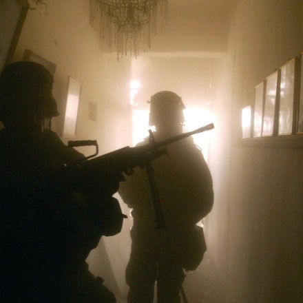 IRAQ - APRIL 06:  Operation Iraqi Freedom : Us Marines Of The 3Rd Regiment, 4Th Battalion On A Mission In The Outskirts Of Baghdad To Seize The East Bridge Granting Main Access To Baghdad. On April 6, 2003 In Baghdad, Iraq. Different Units Secure The Streets, Fire At Armed Iraqi Fighters And Take Public Buildings And Army Bases, Searching For Documents In Offices.  (Photo by Gilles BASSIGNAC/Gamma-Rapho via Getty Images)