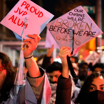 NEW YORK, NEW YORK - NOVEMBER 20: People gather to protest the banning of Students for Justice in Palestine (SJP) and Jewish Voice for Peace (JVP) at Columbia University on November 20, 2023 in New York City. Students, alumni of both schools, some dressed in caps and gowns, and supporters held a "Denouncement Ceremony" and pledged not to donate money to the schools after the banning of the student groups for holding a nonviolent but unsanctioned protest demanding a ceasefire in Gaza. More than 20 progressive elected officials have sent a letter to the university calling for the reinstatement of the groups. Calls for a ceasefire in Gaza continue as the death toll from Israel’s invasion of Gaza has increased in the weeks since the October 7 Hamas attack. (Photo by Michael M. Santiago/Getty Images)