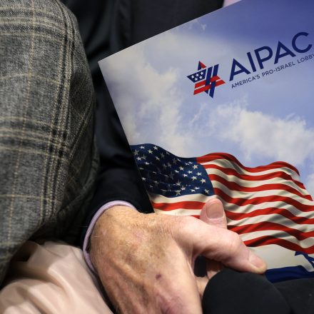 WASHINGTON, DC - MARCH 12: A visitor holds an AIPAC folder in an elevator in Rayburn House Office Building on March 12, 2024 on Capitol Hill in Washington, DC. (Photo by Alex Wong/Getty Images)
