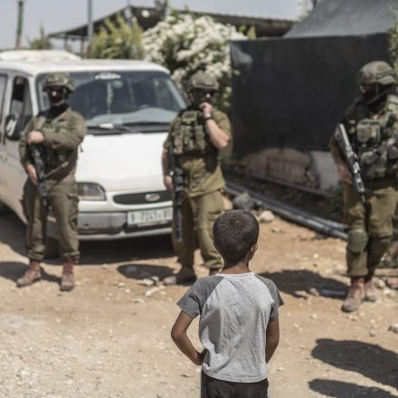 29 July 2025, Palestinian Territories, Hebron: Israeli Defense Forces raid the mourning tent where Palestinians of Umm Al-Khair community gatheted to mourn Awdah Al-Hathaleen, who was shot by an Israeli right-wing settler the previous day. Photo: Ilia Yefimovich/dpa (Photo by Ilia Yefimovich/picture alliance via Getty Images)