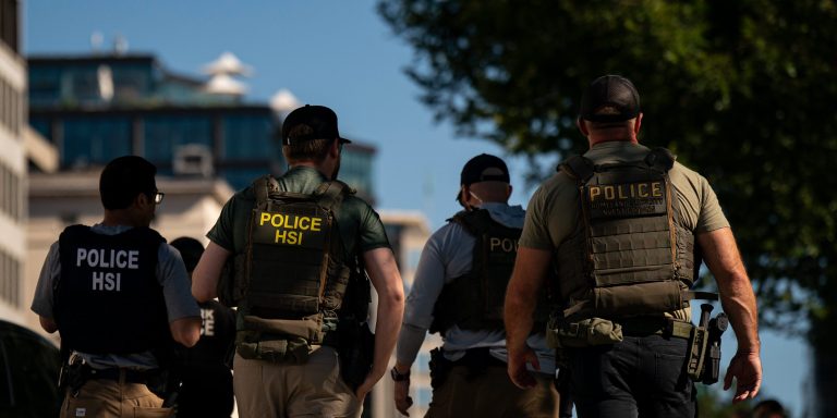 Agents from the US Immigration and Customs Enforcement's Homeland Security Investigations (HSI) unit during a traffic stop near the White House in Washington, DC, US, on Tuesday, Aug. 26, 2025. President Donald Trump threatened that prosecutors would seek the death penalty for anyone found guilty of murder in Washington, DC, a move that would escalate his crime crackdown in the nation's capital. Photographer: Al Drago/Bloomberg via Getty Images
