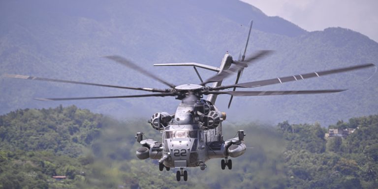 CEIBA, PUERTO RICO - SEPTEMBER 12: A US Marine Sikorsky CH-53K King Stallion helicopter flies at José Aponte de la Torre Airport, formerly Roosevelt Roads Naval Station, on September 12, 2025, in Ceiba, Puerto Rico. The Trump administration recently carried out a drone strike in the southern Caribbean against a boat that had left Venezuela and was suspected of transporting drugs. Eleven people died in the attack. The president claimed that the vessel was operated by the Venezuelan gang Tren de Aragua. (Photo by Miguel J. Rodríguez Carrillo/Getty Images)