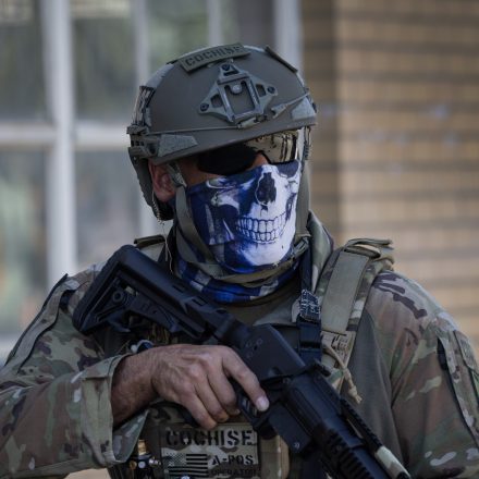 BROADVIEW, ILLINOIS - SEPTEMBER 26: Federal law enforcement agents confront demonstrators protesting outside of an immigration processing center on September 26, 2025 in Broadview, Illinois. The demonstrators, protesting a recent surge in ICE activity in the Chicago area, were pushed back from the facility with a barrage of "less lethal" munitions including stinger ball grenades, pepper balls, tear gas and baton rounds. (Photo by Scott Olson/Getty Images)