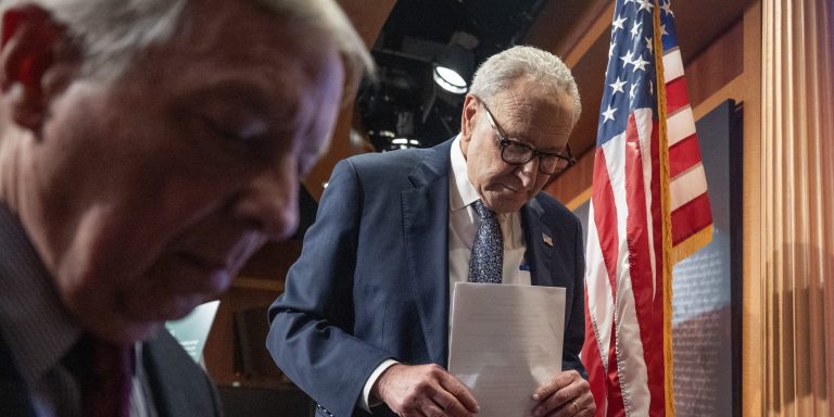 US Senate Minority Leader Chuck Schumer (D-NY) (R) and US Senator Dick Durbin (D-IL) leave a press conference following a Senate vote on Capitol Hill in Washington, DC on September 30, 2025, hours before a partial government shutdown is set to take effect. The US government barreled towards its first shutdown in six years Tuesday, with funding expiring at midnight after Democrats fought a war of words with Donald Trump and senators rejected a last-ditch bid to keep the lights on. (Photo by ANDREW CABALLERO-REYNOLDS / AFP) (Photo by ANDREW CABALLERO-REYNOLDS/AFP via Getty Images)