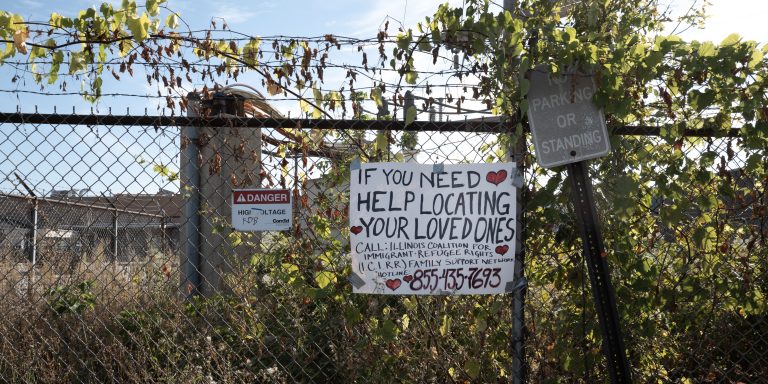 BROADVIEW, ILLINOIS - OCTOBER 02: A sign offering immigrant families help hangs on a fence outside of an immigrant processing and detention center on October 02, 2025 in Broadview, Illinois. The site has been the target of frequent protests as federal law enforcement agents continue Operation Midway Blitz in the Chicago area, an operation designed to apprehend and deport undocumented immigrants living in the area.  (Photo by Scott Olson/Getty Images)