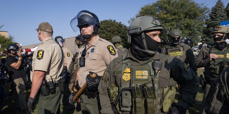 BROADVIEW, ILLINOIS - OCTOBER 03: Police confront demonstrators during a protest outside an immigrant processing and detention center on October 03, 2025 in Broadview, Illinois. The site has been the target of frequent protests as federal law enforcement agents continue Operation Midway Blitz in the Chicago area, an operation designed to apprehend and deport undocumented immigrants living in the area.  (Photo by Scott Olson/Getty Images)