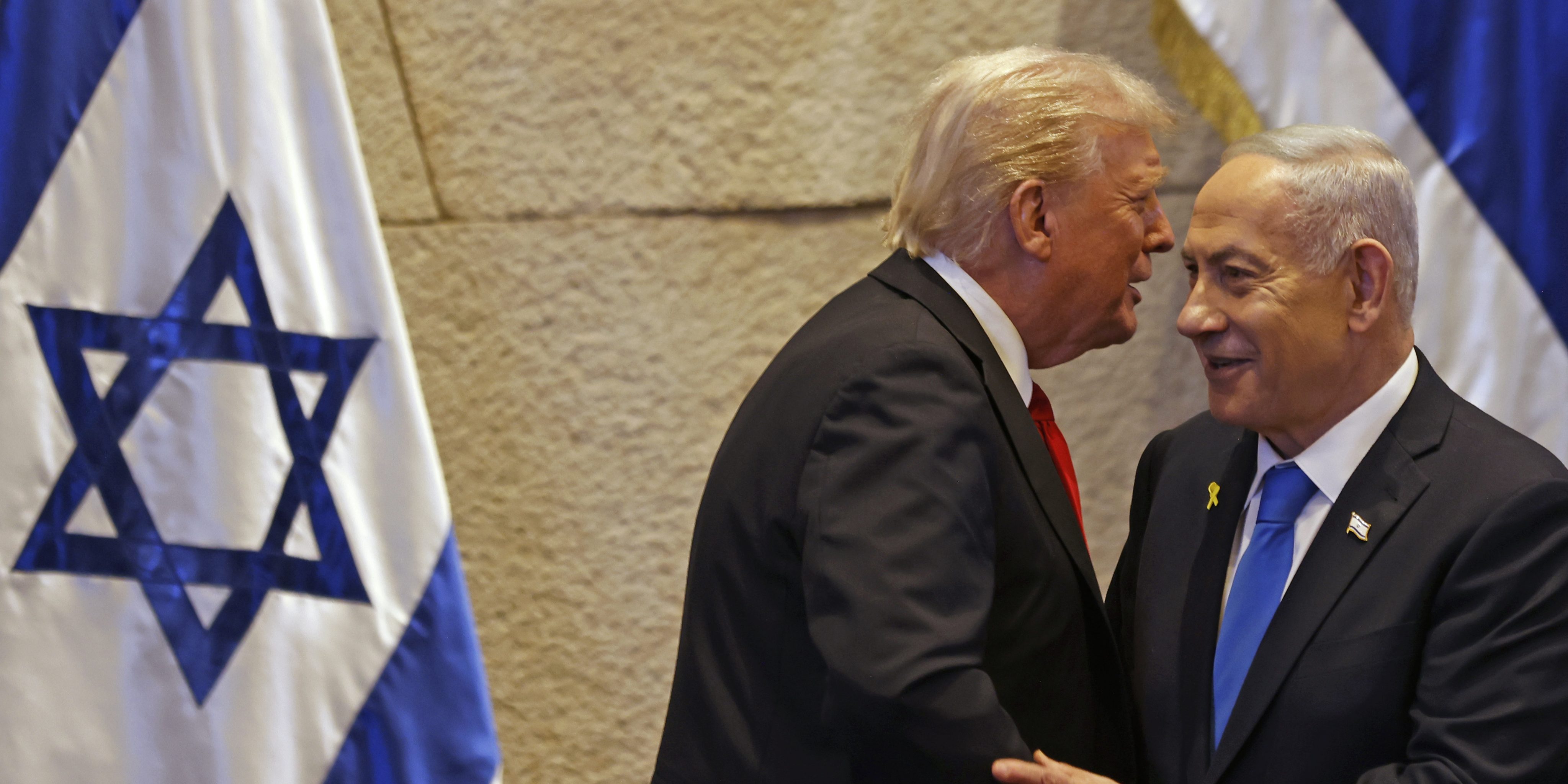 JERUSALEM - OCTOBER 13: U.S. President Donald Trump speaks with Israel's Prime Minister Benjamin Netanyahu in the Knesset, Israel's parliament, on October 13, 2025 in Jerusalem. President Trump is visiting the country hours after Hamas released the remaining Israeli hostages captured on Oct. 7, 2023, part of a US-brokered ceasefire deal to end the war in Gaza. (Photo by Jalaa Marey - Pool/Getty Images)