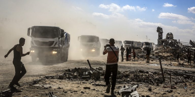 16 October 2025, Palestinian Territories, Khan Yunis: Trucks carrying humanitarian aid and fuel enter Khan Yunis through the Karem Shalom crossing as part of the ceasefire agreement between Israel and Hamas. Photo: Abed Rahim Khatib/dpa (Photo by Abed Rahim Khatib/picture alliance via Getty Images)
