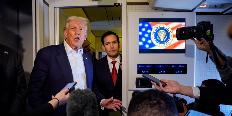 IN FLIGHT - OCTOBER 27: U.S. President Donald Trump, accompanied by U.S. Secretary of State Marco Rubio (R), speaks to members of the media aboard Air Force One on October 27, 2025, in flight. Trump is in route to Japan after attending the Association of Southeast Asian Nations (ASEAN) summit in Malaysia, and will travel on to South Korea for the Asia-Pacific Economic Cooperation (APEC) forum. (Photo by Andrew Harnik/Getty Images)