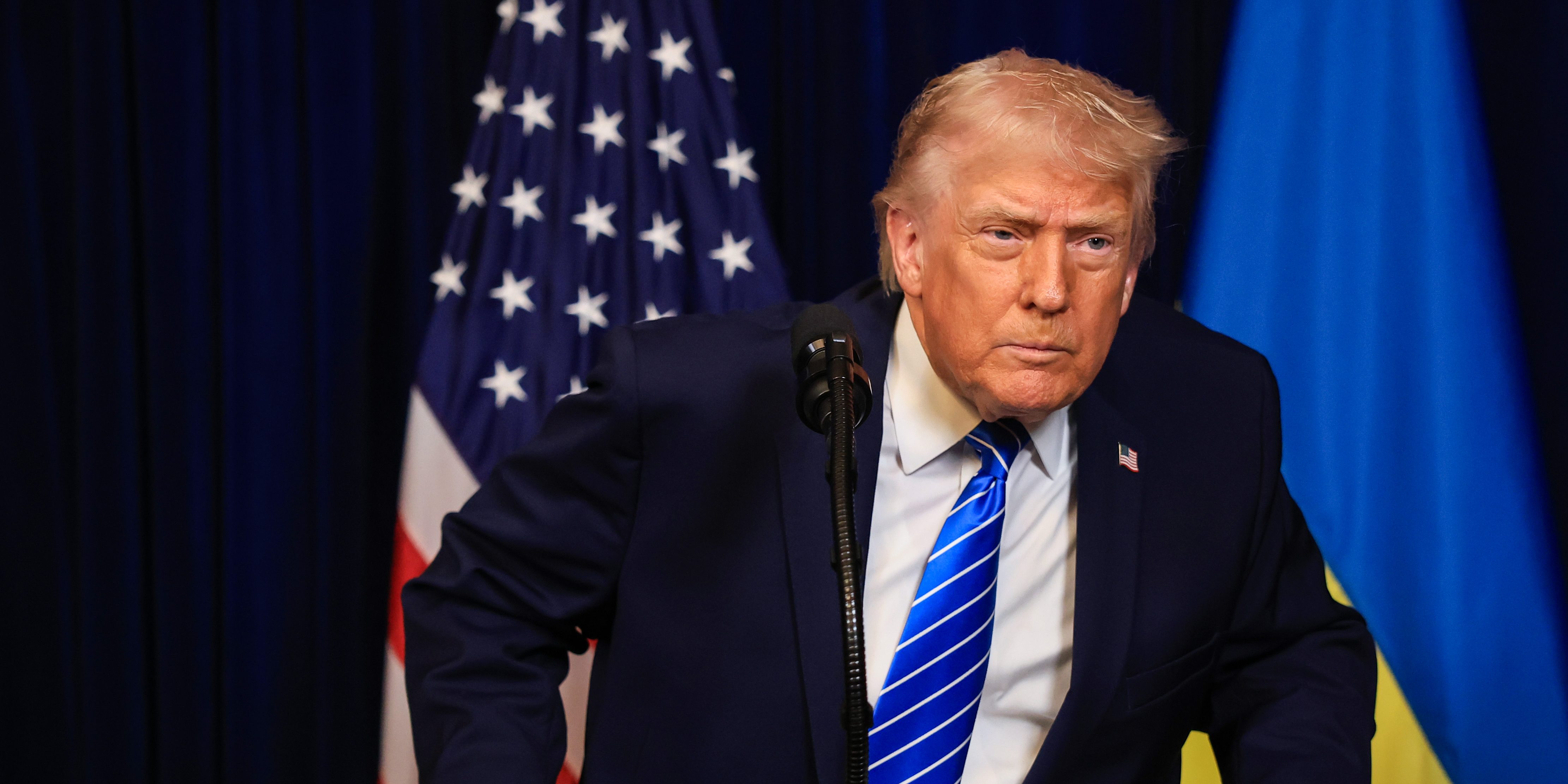 U.S. President Donald Trump listens to a question from a reporter during a press conference with Ukrainian President Volodymyr Zelensky following their meeting at Trump’s Mar-a-Lago club on December 28, 2025 in Palm Beach, Florida.
