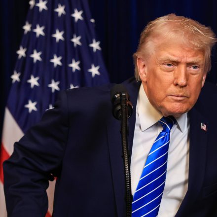 U.S. President Donald Trump listens to a question from a reporter during a press conference with Ukrainian President Volodymyr Zelensky following their meeting at Trump’s Mar-a-Lago club on December 28, 2025 in Palm Beach, Florida.