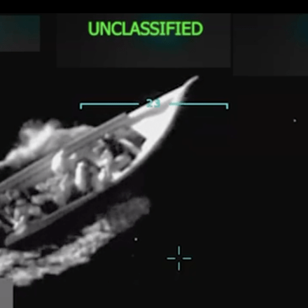A video of a boat in the Caribbean being destroyed by U.S. military forces.